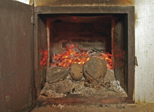 Heated rocks from the oven in the estate pirtis make a sound similar to thunder when they are placed into a wooden bowl filled with water.