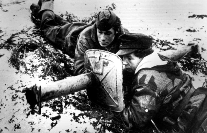 Latvian soldiers in trench with a Panzerschrek anti-tank weapon in Courland, winter 1944-45.
