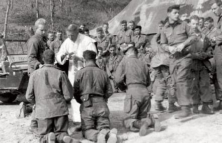 receiving Holy Communion in the war zone.