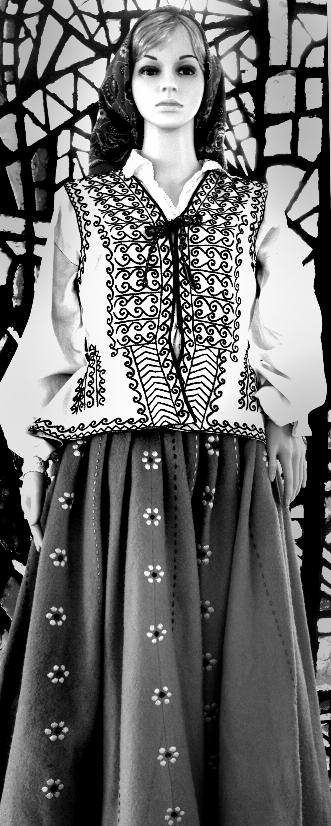 A Latvian national costume hand sewn from tablecloths. A poignant remembrance.